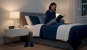 Woman reading in bed during nighttime routine