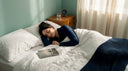 Woman sleeping in calm bedroom setting