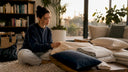 Woman examining cruelty-free cotton bedding on bed