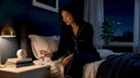 Woman preparing for restful sleep in bedroom