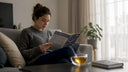 Woman reading sleep education pamphlet at table
