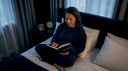 Woman journaling sleep health morning routine
