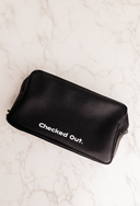 Black pouch with 'Checked Out' text on a white textured background

